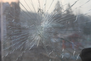 A cracked windshield that needs a windshield replacement in Houston